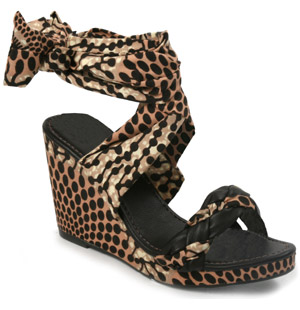 Unique leather and fabric sandal with knotted vamp detail. The gorgeous Hark shoe features a high co