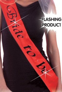 Here comes the Bride!  She`ll look fabulous in this flashing red sash. Just pop it over her shoulder