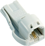 This adaptor consists of   a US-style socket to a BT-style plug  enabling you to connect US-type con
